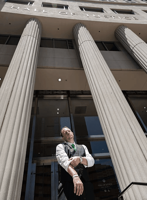 Virginia Beach personal injury lawyer standing outside local courthouse